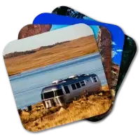 Airstream scenic posters Coaster set featuring an Airstream against a backdrop of scenic images in the American West. Top image shows Airstream adjacent to a lake.
