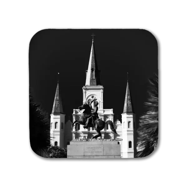 Coaster featuring a B&W image of a striking contrasty image of Andrew Jackson statue with the St Louis Cathedral in the background with a very dark sky