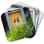 Coaster set featuring images of snoballs decorating various doors in New Orleans