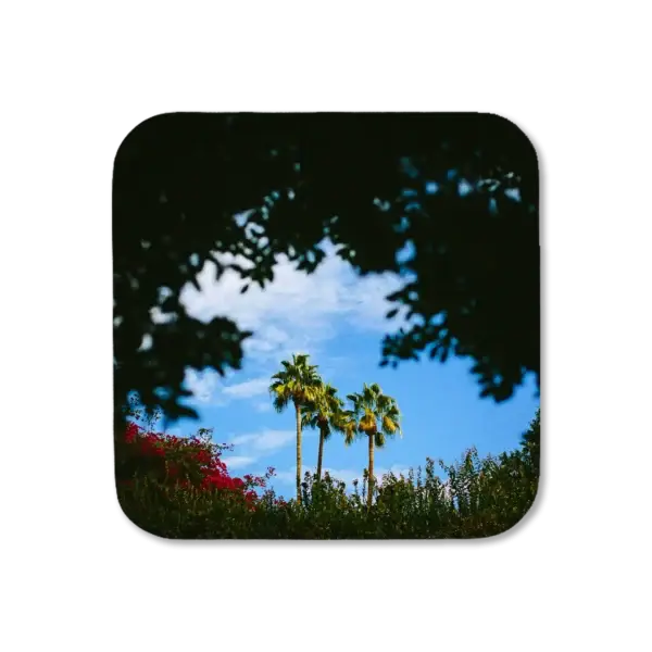 Palm trees framed by out-of-focus vegetation, artwork for a coaster