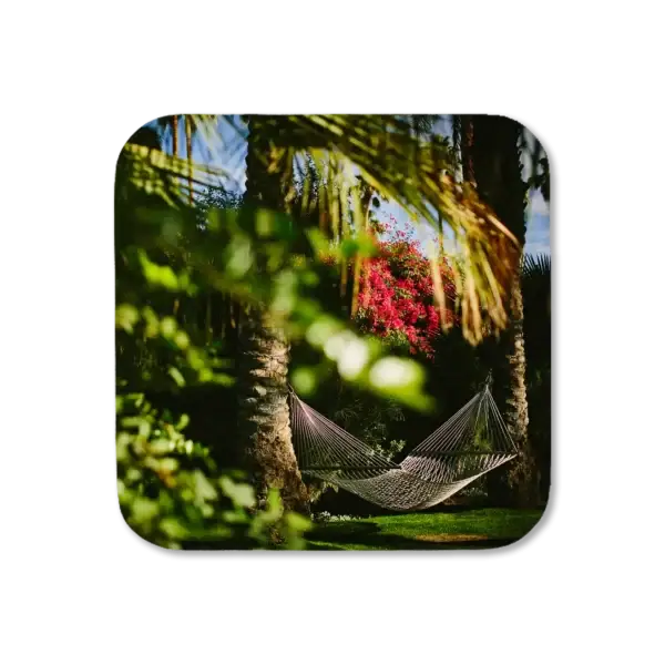 Hammock tied between two palm trees, artwork for a coaster
