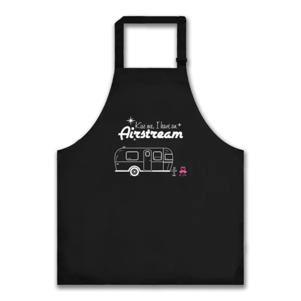 Black apron with "Kiss Me, I have an Airstream" text in a mid-century modern typeface with Airstream trailer graphic