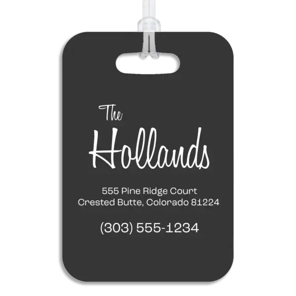 Colored reverse side of a premium luggage tag, showing the owner's name in a mid-century modern script font, plus their address and contact information in a wide, modern font.