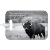 Grand Teton Buffalo Luggage Tag Premium luggage tag featuring a bison in a field with mountains in the background. Superimposed text says "Toto, I've a feeling we're not in Kansas anymore" by Dorothy in The Wizard of Oz