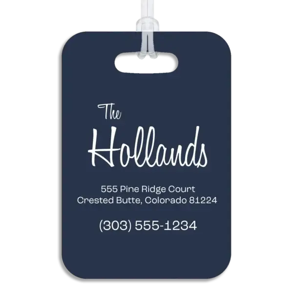 Colored reverse side of a premium luggage tag, showing the owner's name in a mid-century modern script font, plus their address and contact information in a wide, modern font.