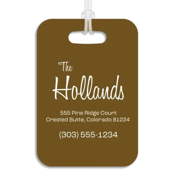 Colored reverse side of a premium luggage tag, showing the owner's name in a mid-century modern script font, plus their address and contact information in a wide, modern font.