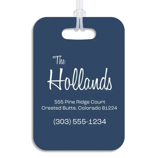 Colored reverse side of a premium luggage tag, showing the owner's name in a mid-century modern script font, plus their address and contact information in a wide, modern font.