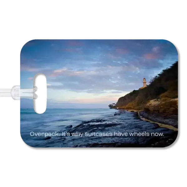 Diamond Head Hawaii Sunrise Luggage Tag Premium luggage tag featuring a Hawaiian beach just south of Diamond Head at sunrise. Superimposed text says, Overpack. It's why suitcases have wheels now.