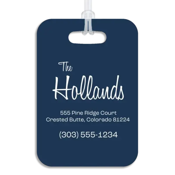 Colored reverse side of a premium luggage tag, showing the owner's name in a mid-century modern script font, plus their address and contact information in a wide, modern font.
