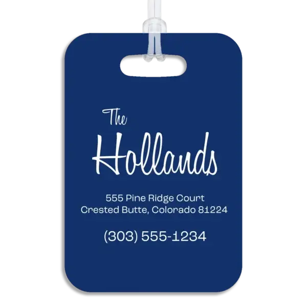 Colored reverse side of a premium luggage tag, showing the owner's name in a mid-century modern script font, plus their address and contact information in a wide, modern font.