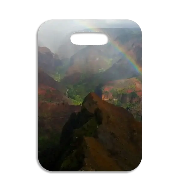 Premium luggage tag featuring a Kauai mountainous coastline with a colorful rainbow.