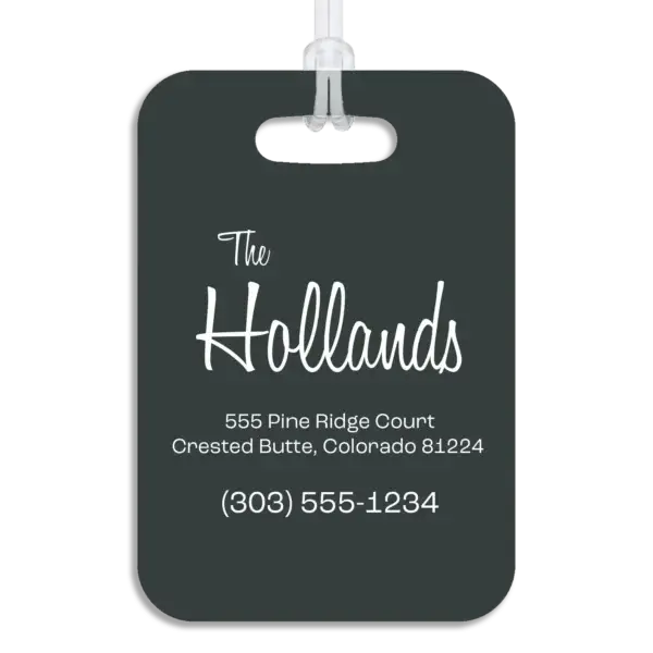 Colored reverse side of a premium luggage tag, showing the owner's name in a mid-century modern script font, plus their address and contact information in a wide, modern font.