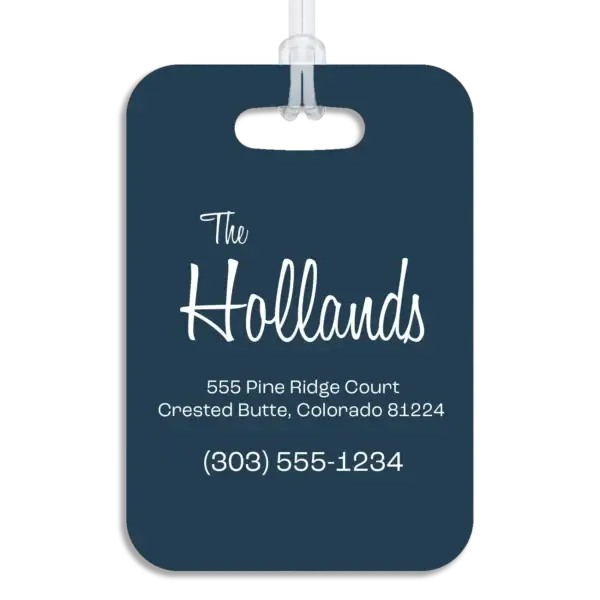 Colored reverse side of a premium luggage tag, showing the owner's name in a mid-century modern script font, plus their address and contact information in a wide, modern font.